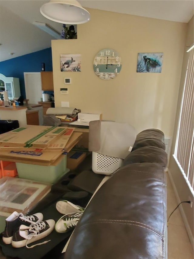 dining room featuring vaulted ceiling