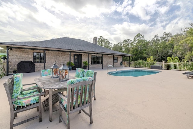 view of pool with a patio area