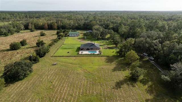 birds eye view of property with a rural view