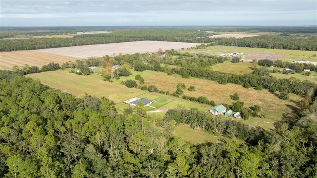 birds eye view of property featuring a rural view