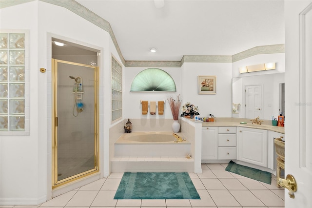 bathroom with vanity, plus walk in shower, and tile patterned floors