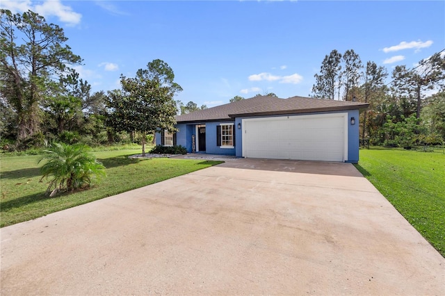 view of front of property featuring an attached garage, concrete driveway, a front yard, and stucco siding