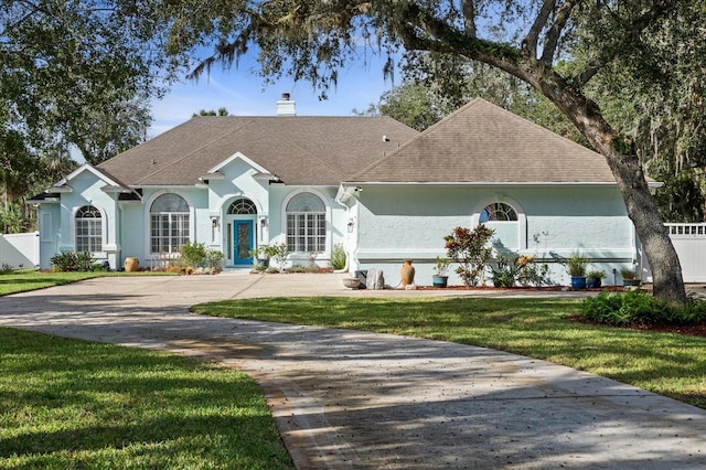 view of front of home with a front yard