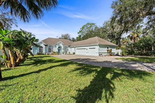 ranch-style home with a front lawn and a garage