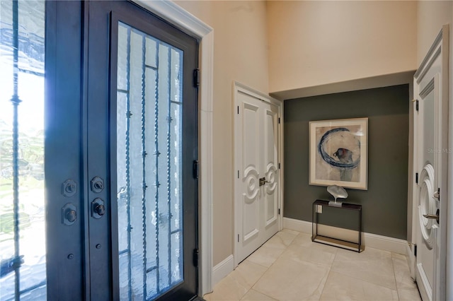 view of tiled foyer entrance