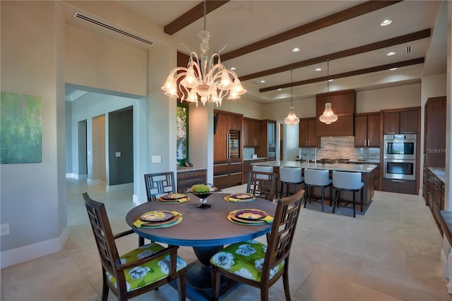 dining area featuring beam ceiling and a notable chandelier