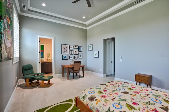 bedroom featuring ceiling fan, a towering ceiling, ornamental molding, and connected bathroom