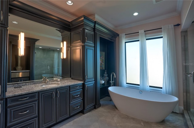 bathroom with separate shower and tub, vanity, and ornamental molding