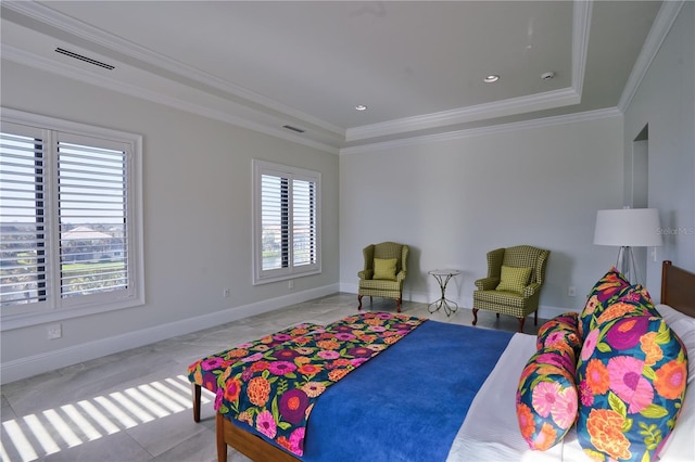 bedroom featuring crown molding and a tray ceiling