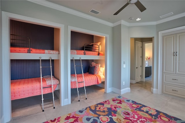 bedroom featuring light tile patterned floors, ceiling fan, and ornamental molding