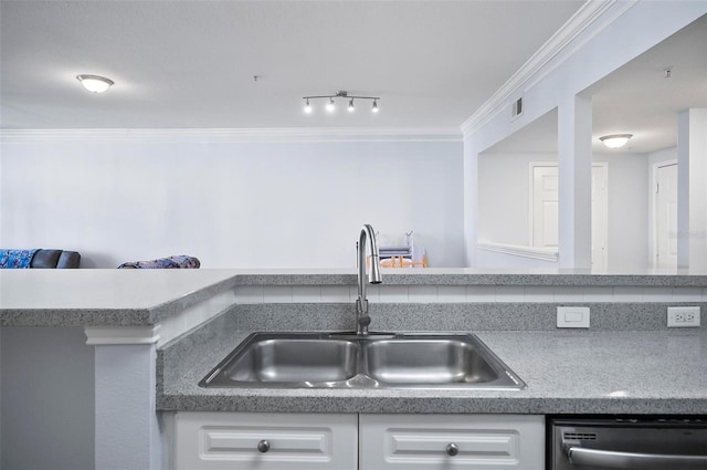 kitchen with stainless steel dishwasher, white cabinetry, sink, and ornamental molding