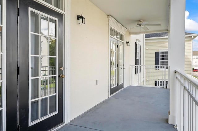 balcony featuring covered porch and ceiling fan