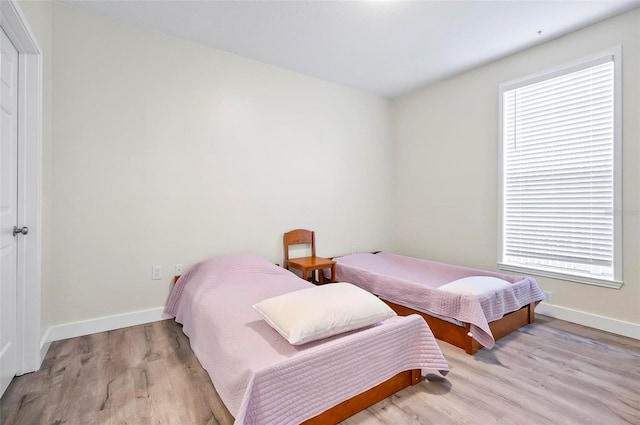 bedroom featuring light hardwood / wood-style flooring