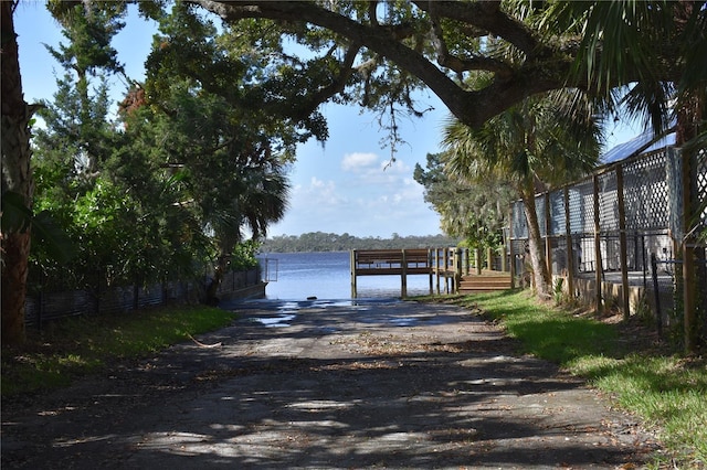 dock area featuring a water view