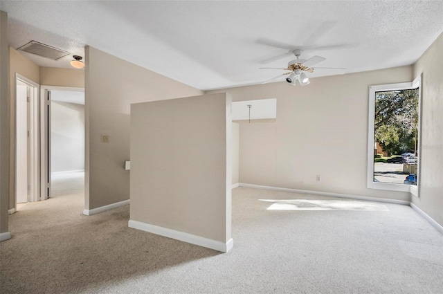 18 Broadmore Cir Unit 18, Palm Coast, FL 32137 - spare room featuring light colored carpet and ceiling fan