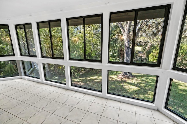 unfurnished sunroom with plenty of natural light