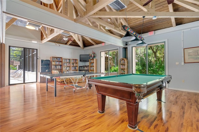 game room with beamed ceiling, a healthy amount of sunlight, light wood-type flooring, and pool table