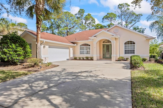 view of front of house with a garage