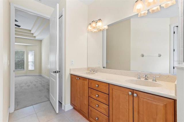 bathroom featuring tile patterned flooring and vanity