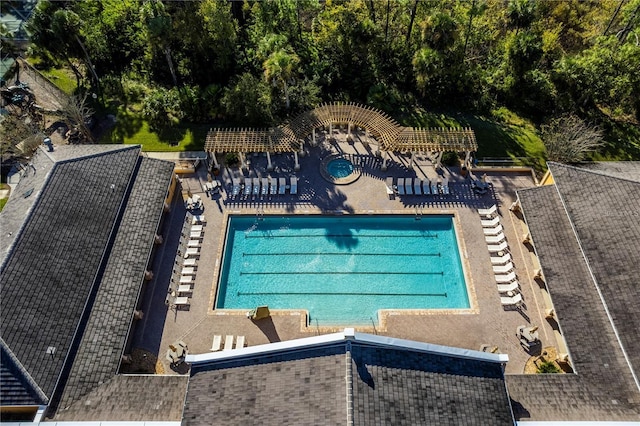 view of swimming pool featuring a patio area