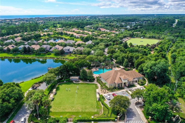 birds eye view of property featuring a water view