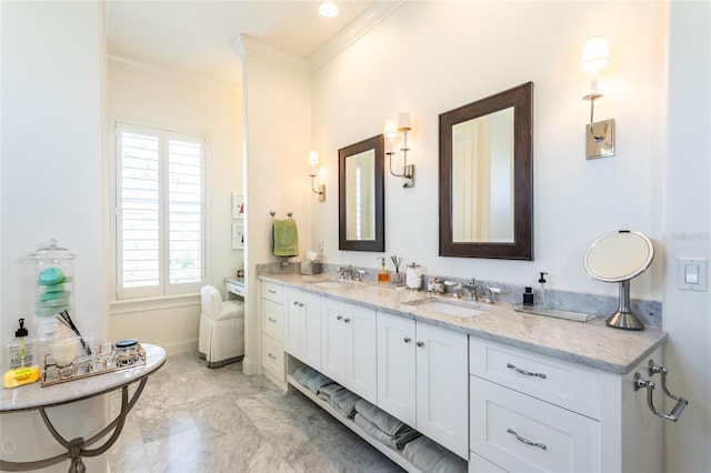 bathroom with vanity and crown molding