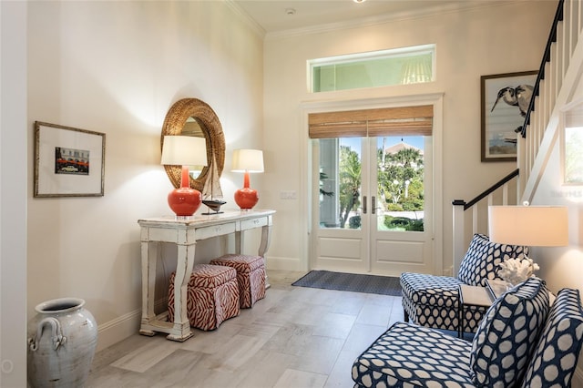 entryway with crown molding