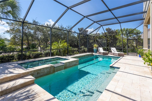 view of pool with glass enclosure and an in ground hot tub