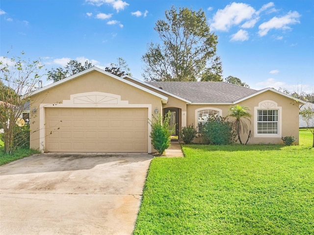 ranch-style home with a front yard and a garage