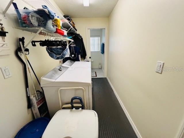 laundry area featuring separate washer and dryer