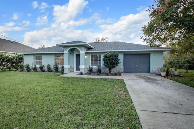 ranch-style house with a garage and a front lawn