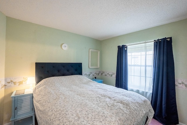 bedroom with a textured ceiling