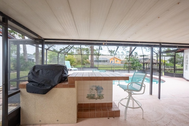 unfurnished sunroom featuring a pool