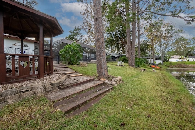 view of yard featuring a lanai