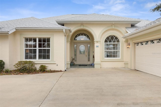 property entrance featuring a garage