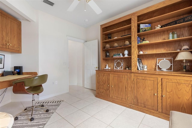 home office featuring ceiling fan and light tile patterned floors