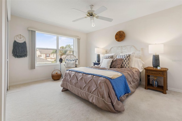 34 Clermont Ct, Palm Coast, FL 32137 - carpeted bedroom with baseboards and ceiling fan