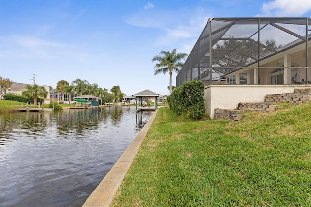 34 Clermont Ct, Palm Coast, FL 32137 - dock area featuring a water view, a lawn, and a lanai