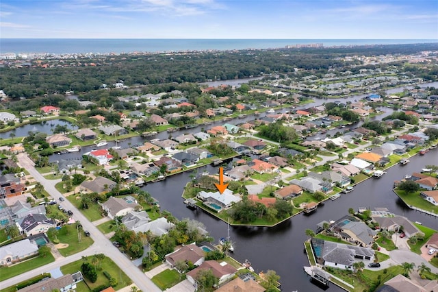 bird's eye view with a water view