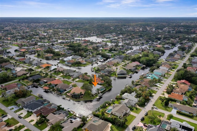 34 Clermont Ct, Palm Coast, FL 32137 - aerial overview of property's location with nearby suburban area and a nearby body of water