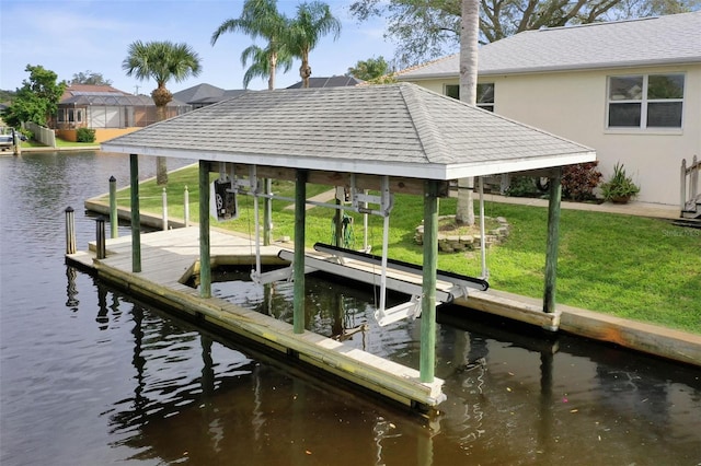 34 Clermont Ct, Palm Coast, FL 32137 - dock area featuring boat lift, a water view, and a yard