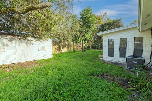 view of yard featuring central AC unit