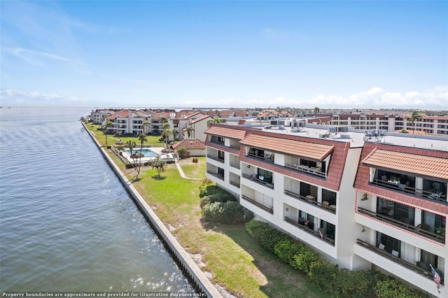 drone / aerial view with a water view