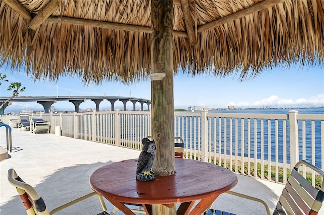 view of patio featuring a water view