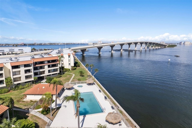 birds eye view of property featuring a water view