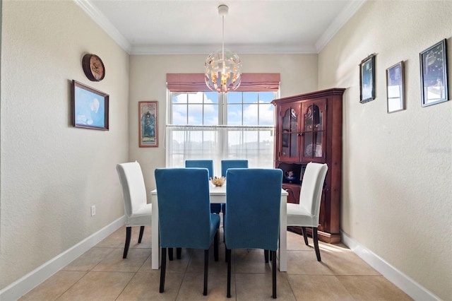 dining area with crown molding, light tile patterned floors, and a chandelier