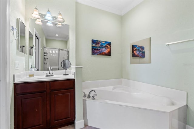 bathroom featuring vanity, crown molding, and separate shower and tub