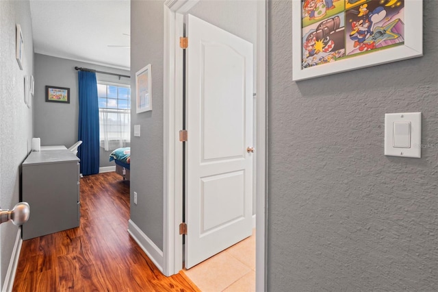 hallway with dark wood-type flooring