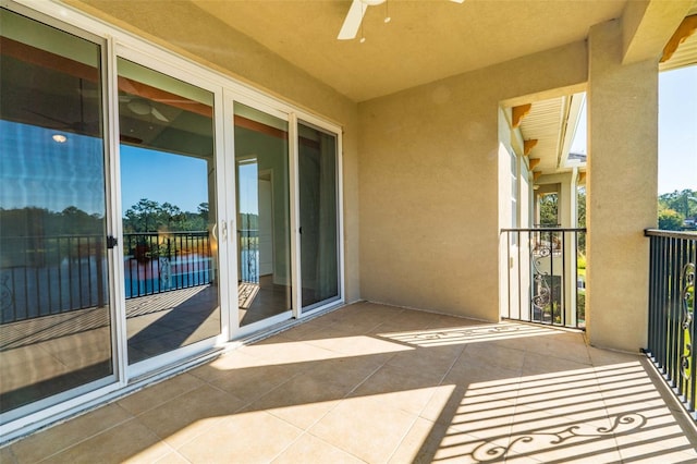 balcony featuring ceiling fan