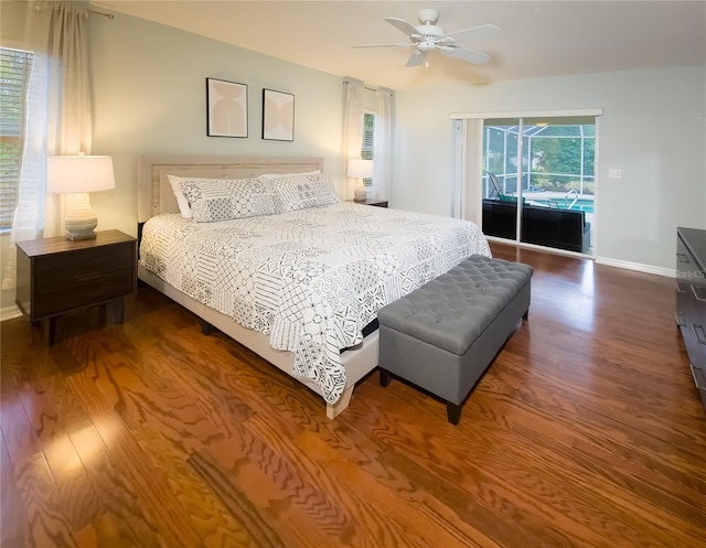 bedroom with access to outside, ceiling fan, and dark hardwood / wood-style floors